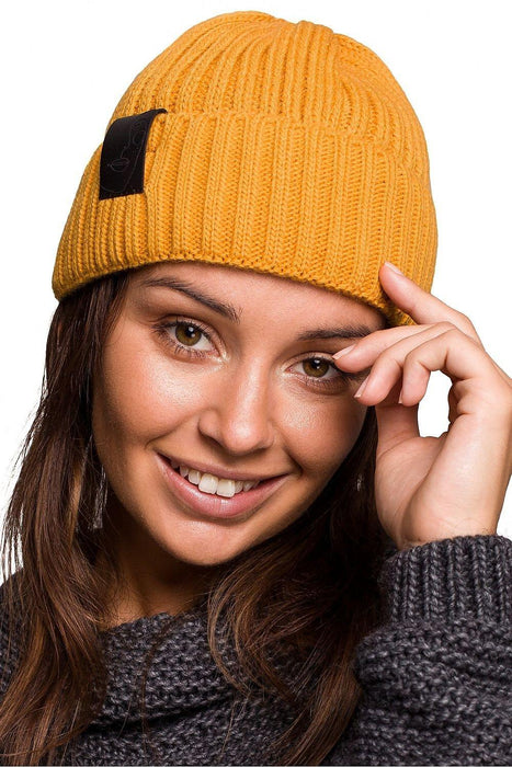 Trendy Acrylic Knit Beanie with Stylish Faux-Leather Face Detail