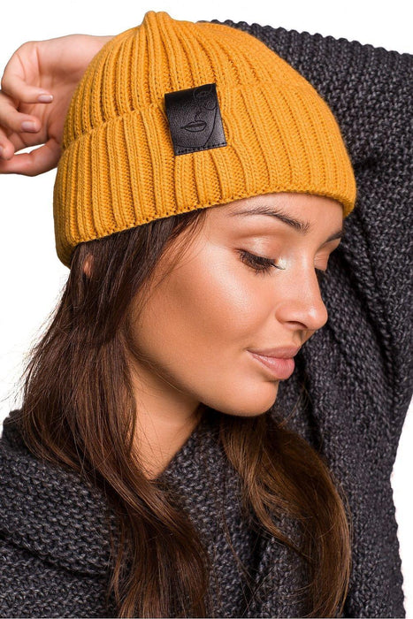 Trendy Acrylic Knit Beanie with Stylish Faux-Leather Face Detail