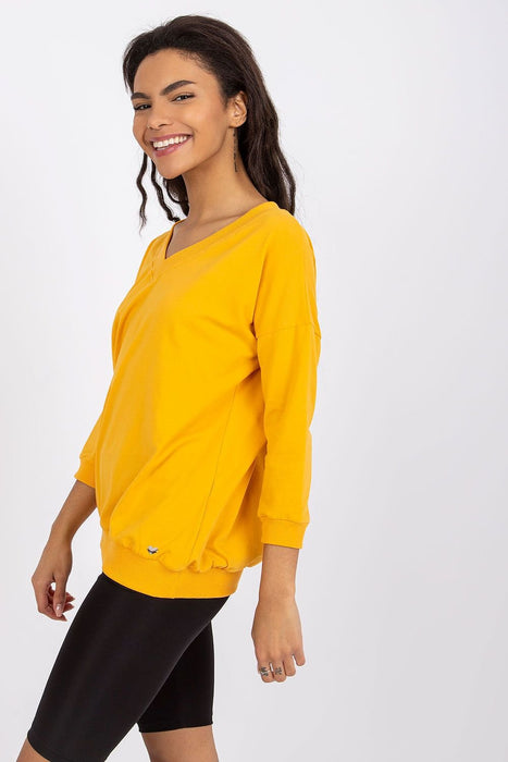 Elegant V-Neck Blouse with Ribbed Cuffs