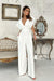 Chic Wide-Leg Jumpsuit with Flared Sleeves and Statement Belt