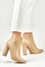 Sophisticated Stiletto Booties with Glamorous Metal Detailing