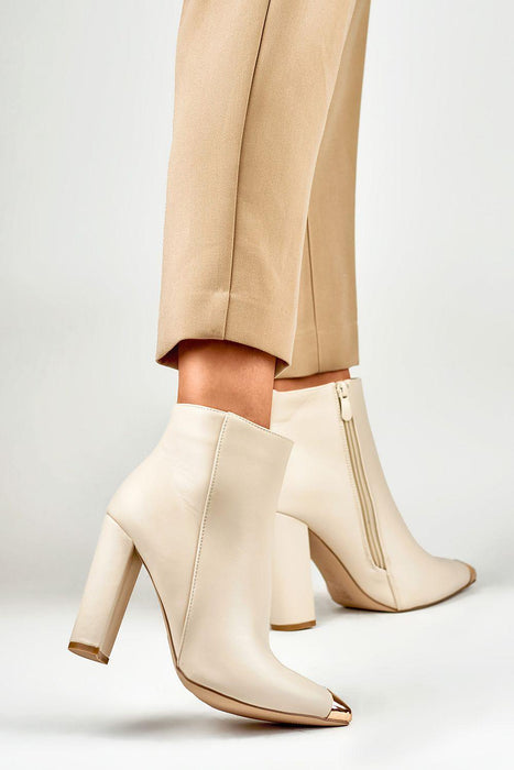 Sophisticated Stiletto Booties with Glamorous Metal Detailing