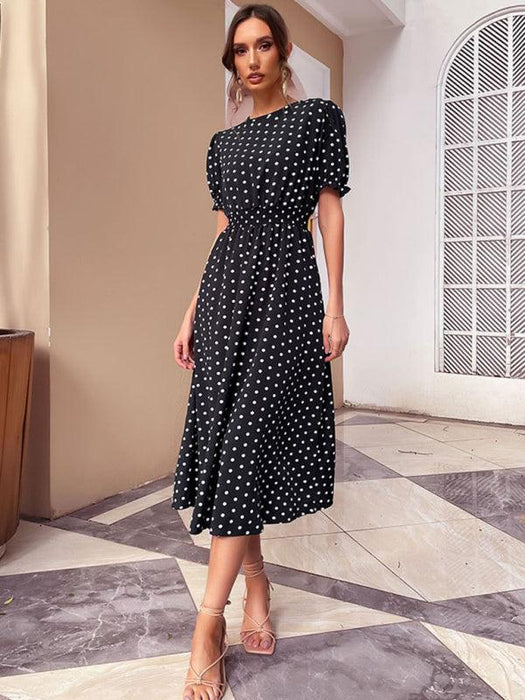 Vintage Inspired Black Polka Dot Dress with Flattering Midi Skirt