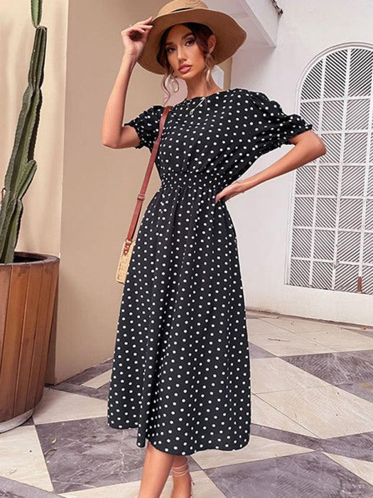 Vintage Inspired Black Polka Dot Dress with Flattering Midi Skirt