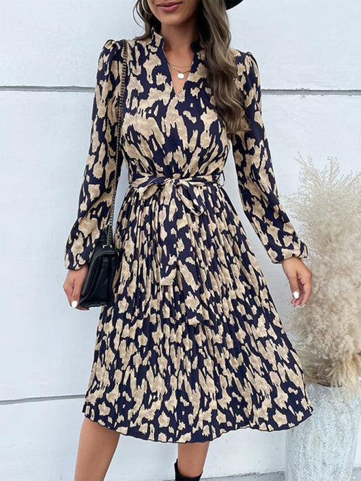 Leopard Elegance: Chic Long Sleeve Dress with Pleated Hem - Timeless and Graceful