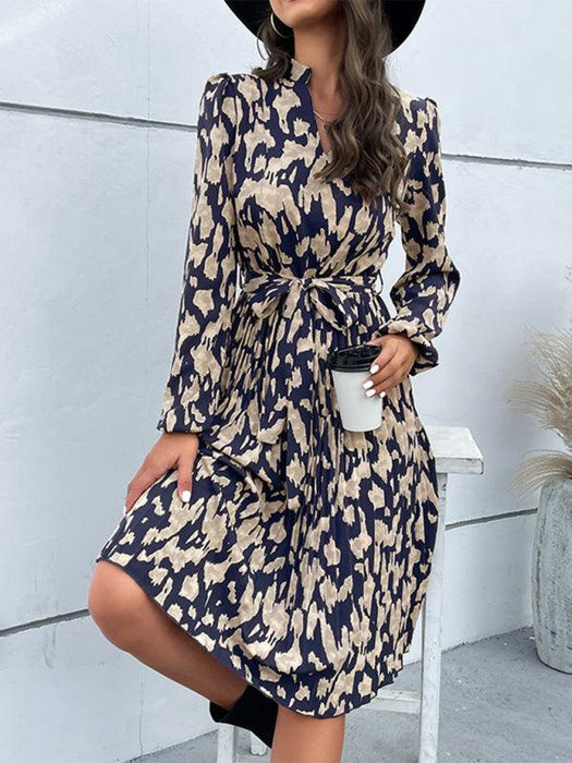 Leopard Elegance: Chic Long Sleeve Dress with Pleated Hem - Timeless and Graceful