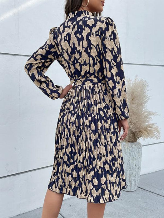 Leopard Elegance: Chic Long Sleeve Dress with Pleated Hem - Timeless and Graceful