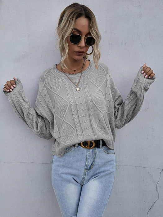 Effortless Elegance: Loose Knit Sweater with a Twist