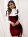Seductive Velvet Suspender Dress with Flirty Slit and Bow Accent