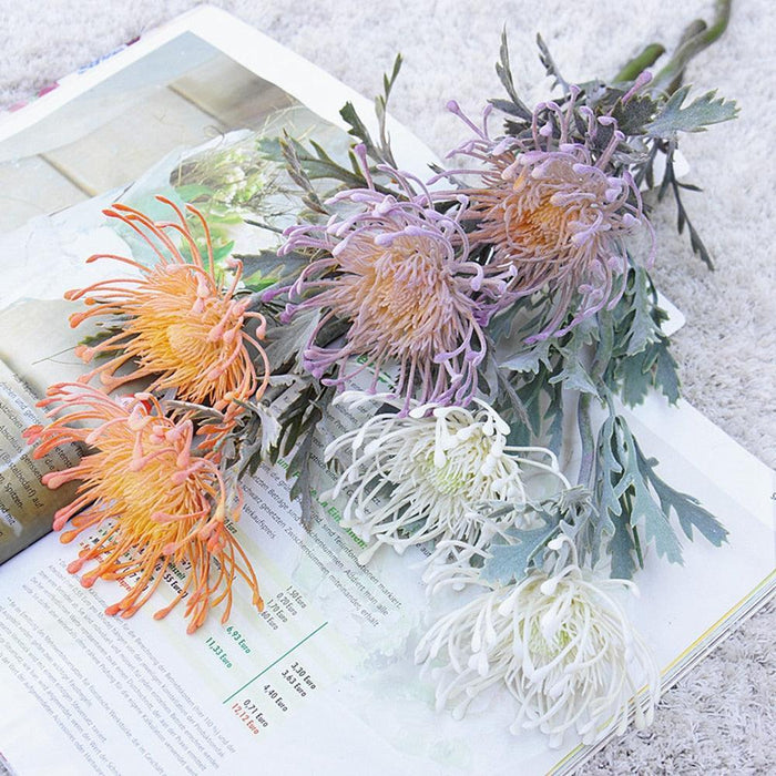 Elegant Crab Claw Floral Arrangement with Festive Garland Vase