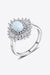 Opal and Zircon Embellished Platinum Ring with Modern Elegance