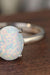 Elegant Opal Solitaire Sterling Silver Ring with Platinum Plating