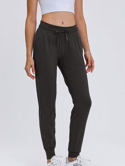 Chic and Functional: Trendy Tied Joggers with Versatile Pockets