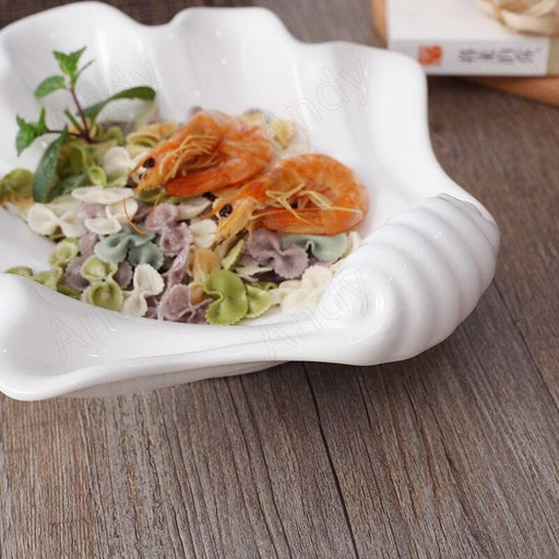Shell-Inspired Artisanal Ceramic Plate for Exquisite Dining