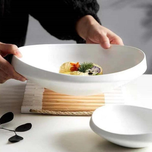 Elevate Your Table Setting with Unique Nest Ceramic Irregular Dish Set