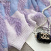 Lavender Cashmere Knit Sweater with Sophisticated O-Neck and Wavy Stripe Details