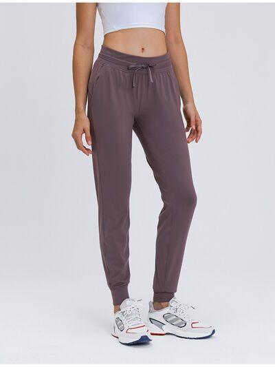 Chic and Functional: Trendy Tied Joggers with Versatile Pockets