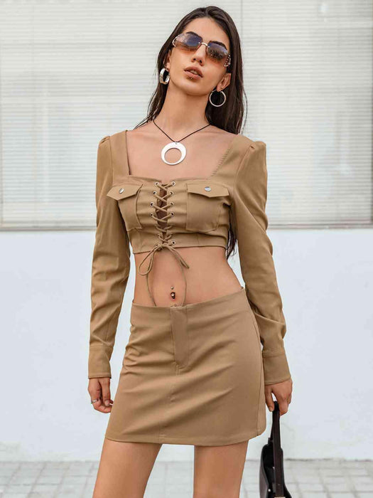 Trendy Lace-Up Crop Top and Skirt Ensemble with a Modern Flair